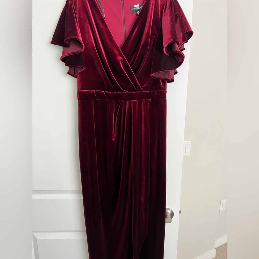 Long burgundy occasion dress.